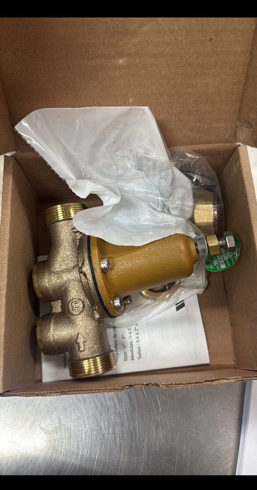Brass pressure reducing valve ready for water main installation in Vancouver